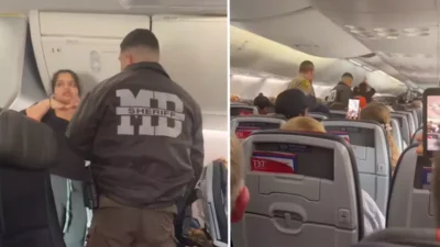 American Airlines’a ait bir uçuşta, telefonundan kulaklık takmadan yüksek sesle